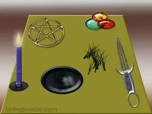 A simple example of the top of an altar and some of the items that would commonly be on it. Pentagram, Athame (ceremonial dagger), plate for burning items, candle, stones, and herbs are depicted here.